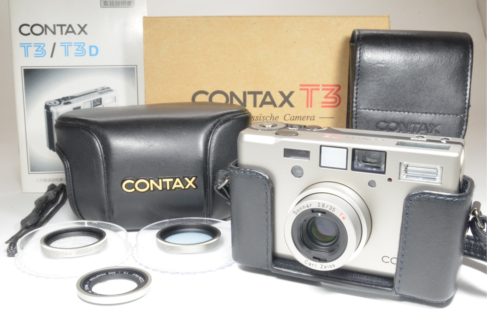 contax t3 double teeth boxed w/ leather case, adapter and 2 filters