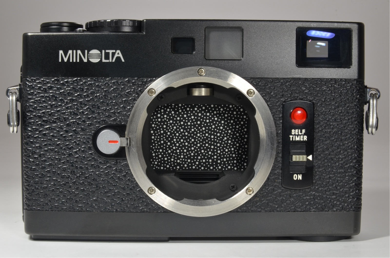 minolta cle film camera with m-rokkor 40mm, 28mm, 90mm and flash