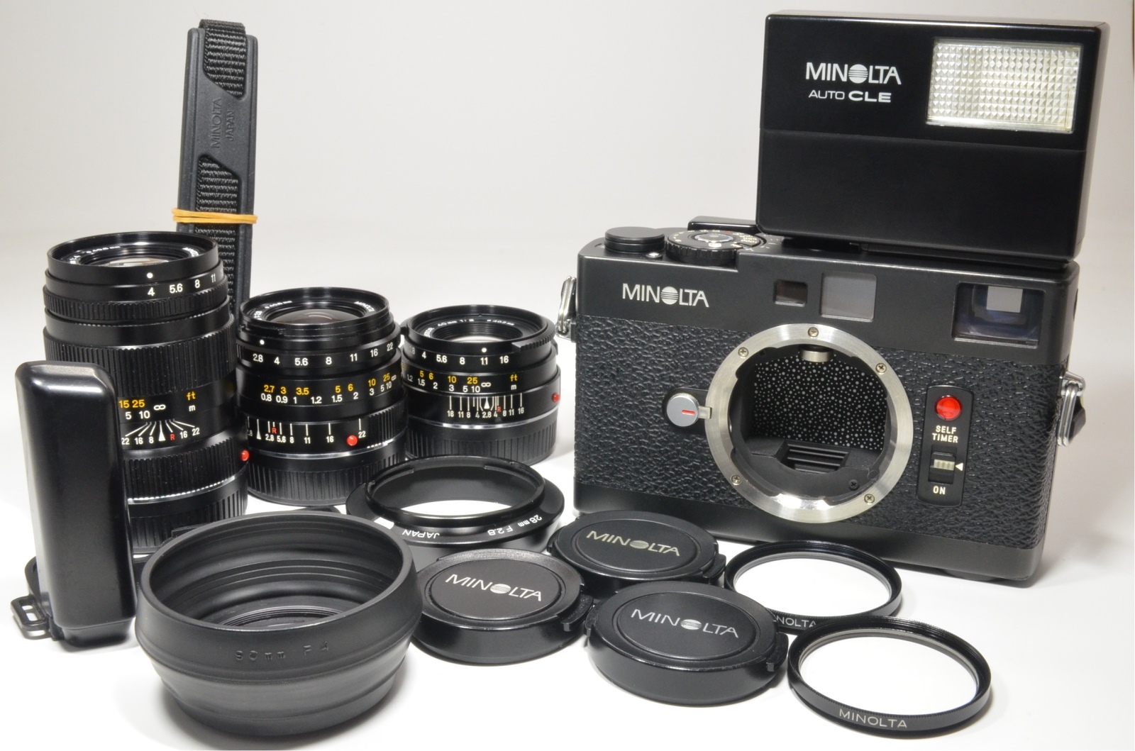 minolta cle film camera with m-rokkor 40mm, 28mm, 90mm and flash