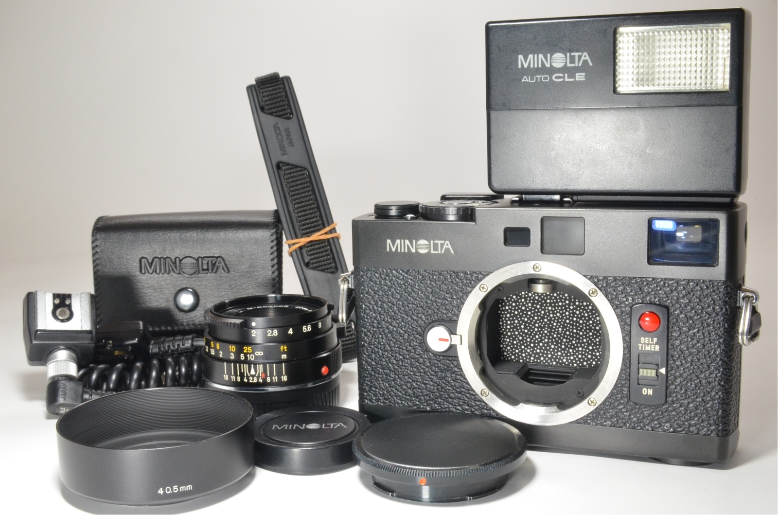 minolta cle with m-rokkor 40mm f2, strap, flash, cable oc