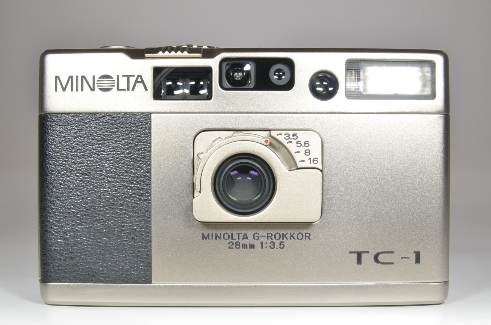 minolta tc-1 p&s film camera 28mm f3.5 with half leather case