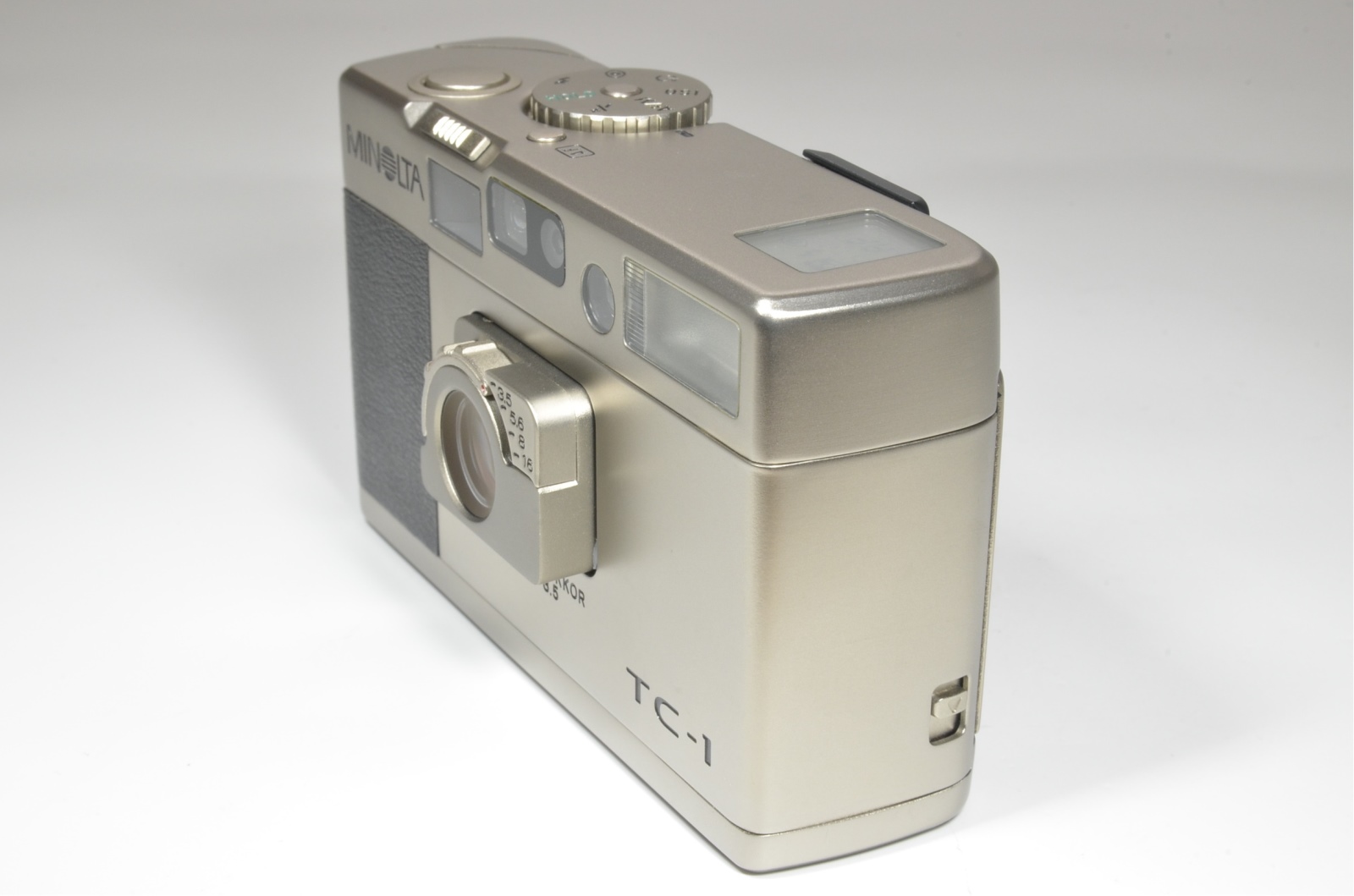 minolta tc-1 p&s film camera 28mm f3.5 with half leather case