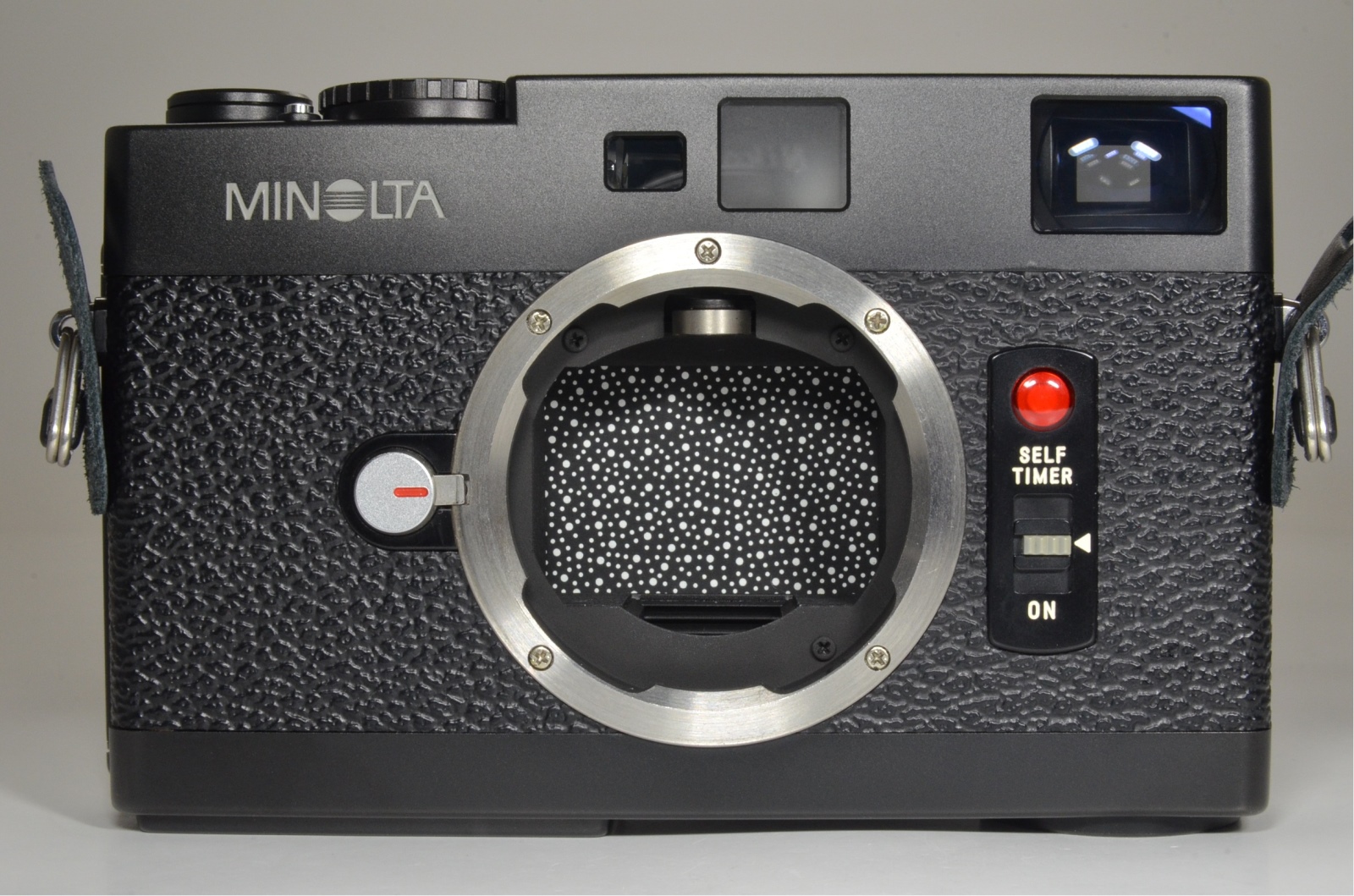 minolta cle film camera w/ m-rokkor 40mm, 28mm, 90mm and flash, film tested