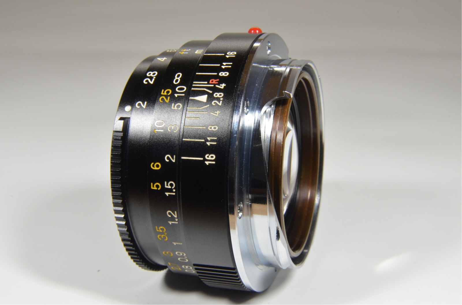 minolta cle film camera w/ m-rokkor 40mm, 28mm, 90mm and flash, film tested