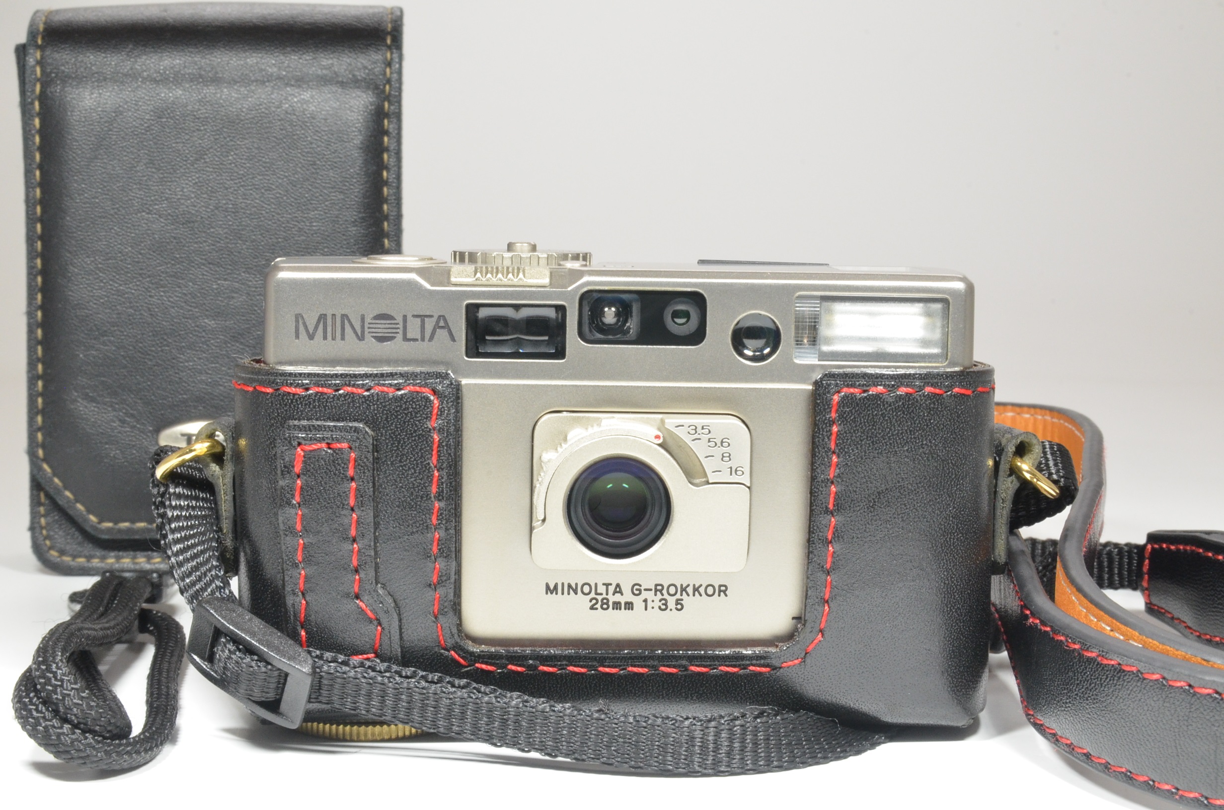 minolta tc-1 p&s film camera 28mm f3.5 with half leather case