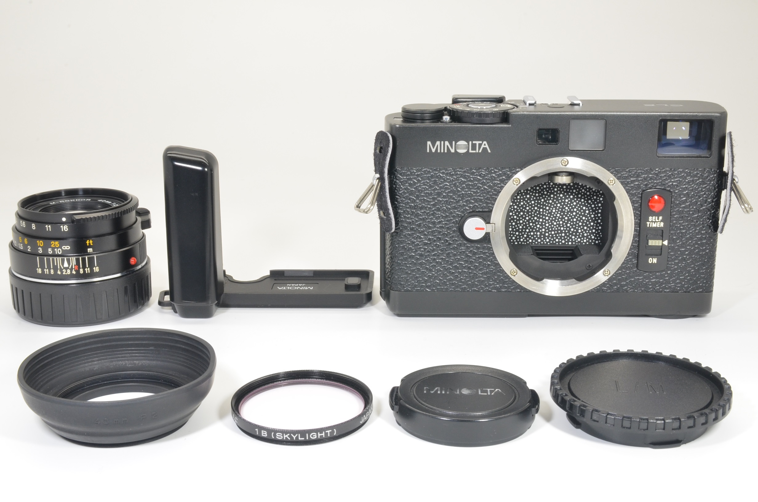 minolta cle film camera with m-rokkor 40mm f2 and hand grip  film tested