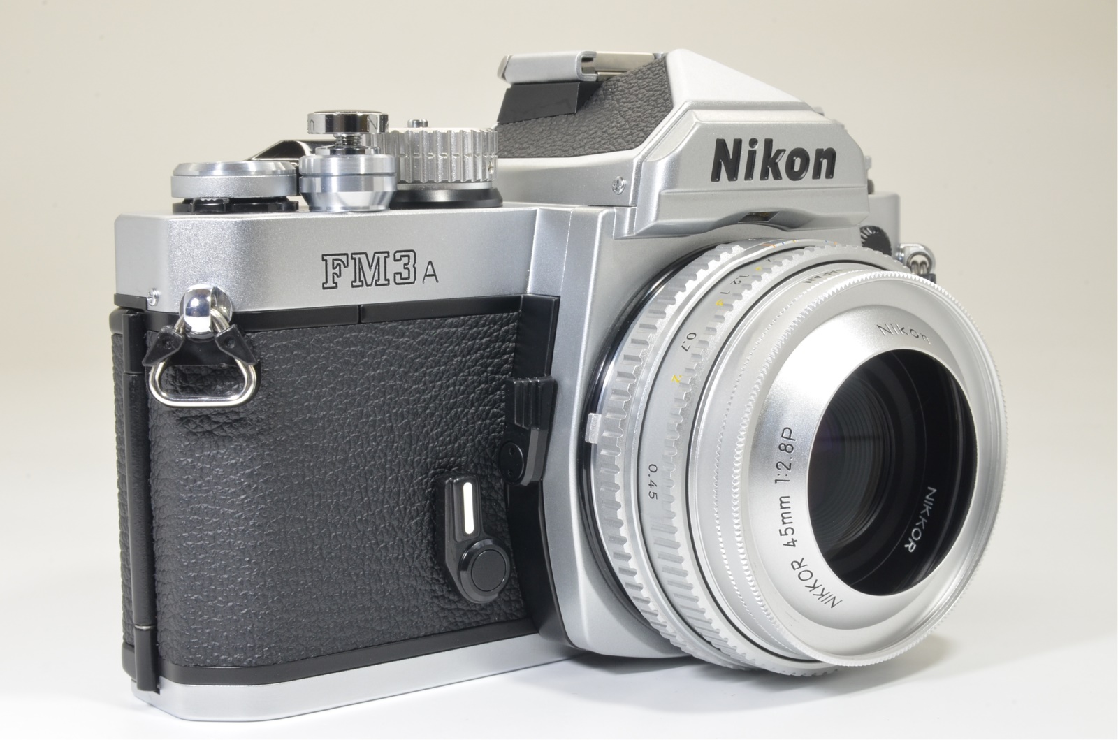 nikon fm3a silver 35mm film camera with nikkor 45mm f/2.8p film tested